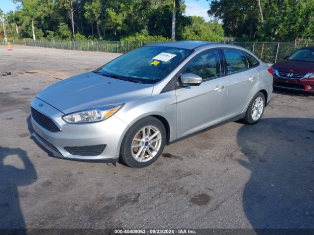 Photo 1 VIN: 1FADP3F28GL352667 - FORD FOCUS 