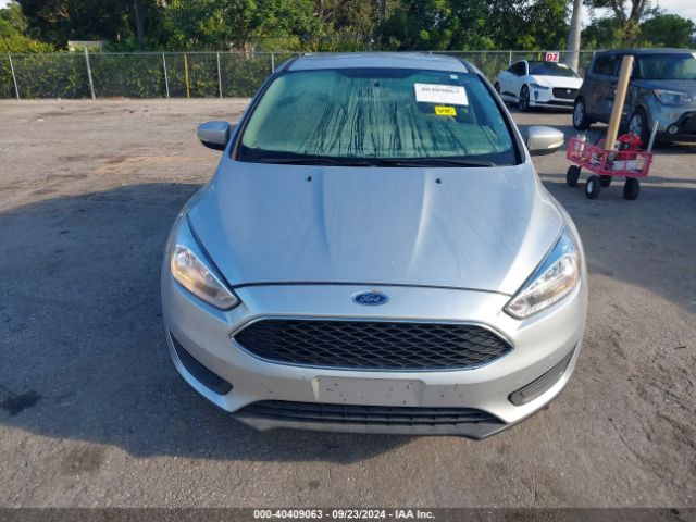 Photo 5 VIN: 1FADP3F28GL352667 - FORD FOCUS 