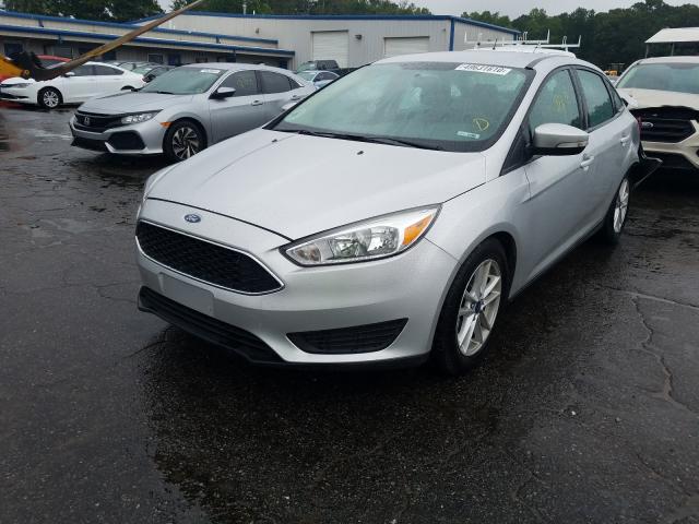 Photo 1 VIN: 1FADP3F28GL355097 - FORD FOCUS SE 