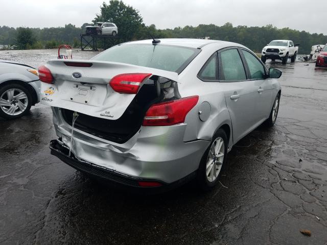 Photo 3 VIN: 1FADP3F28GL355097 - FORD FOCUS SE 