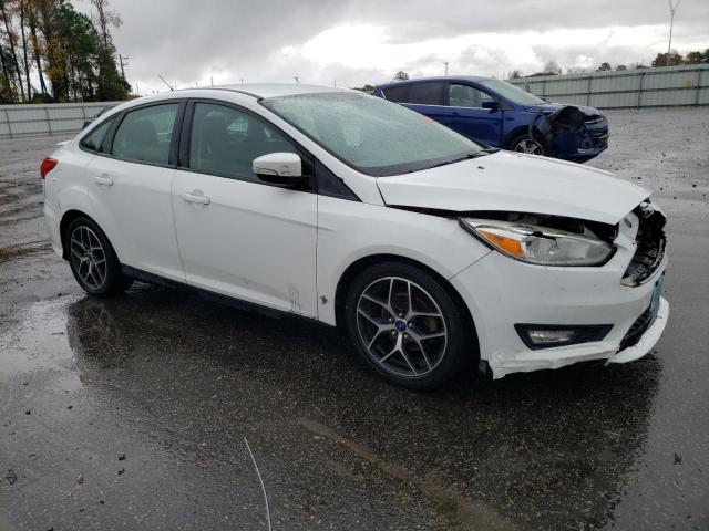 Photo 3 VIN: 1FADP3F28GL355651 - FORD FOCUS 