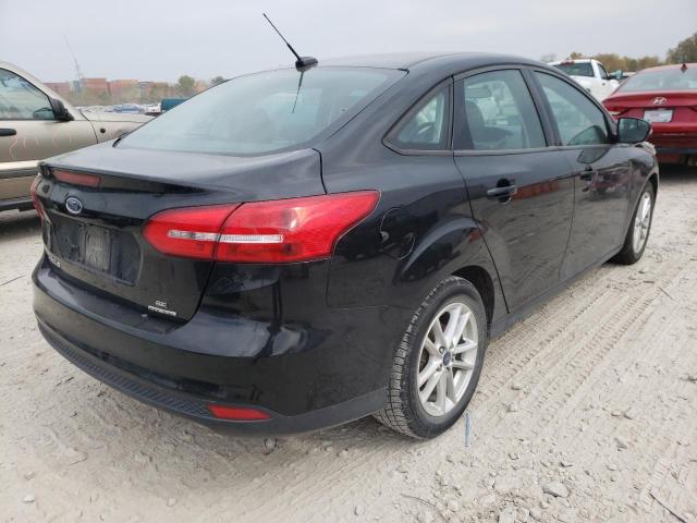 Photo 3 VIN: 1FADP3F28GL359229 - FORD FOCUS SE 