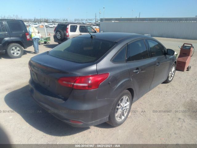 Photo 3 VIN: 1FADP3F28GL360011 - FORD FOCUS 