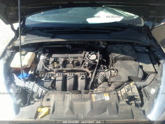 Photo 9 VIN: 1FADP3F28GL360011 - FORD FOCUS 