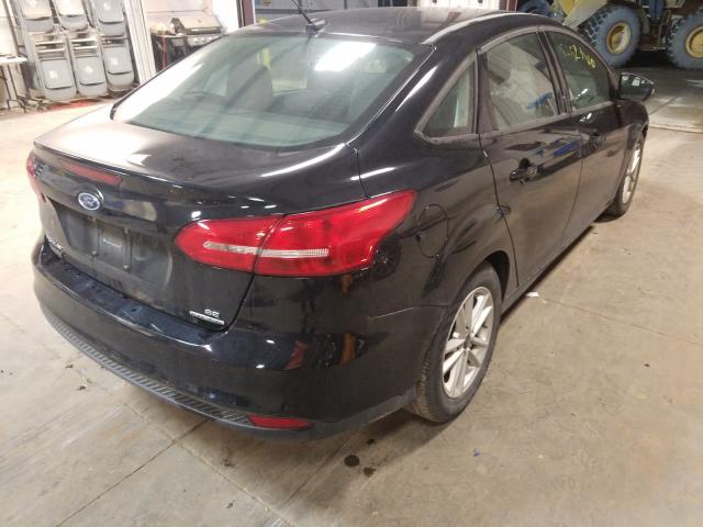 Photo 3 VIN: 1FADP3F28GL390299 - FORD FOCUS SE 