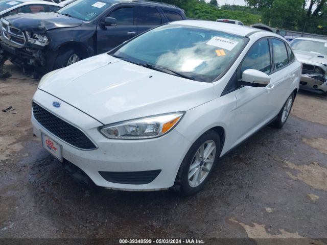 Photo 1 VIN: 1FADP3F28GL392442 - FORD FOCUS 