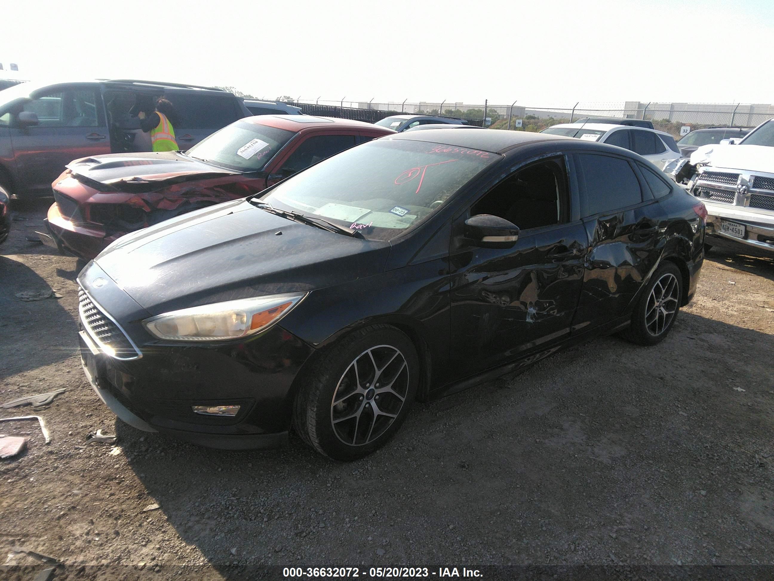 Photo 1 VIN: 1FADP3F28GL404475 - FORD FOCUS 