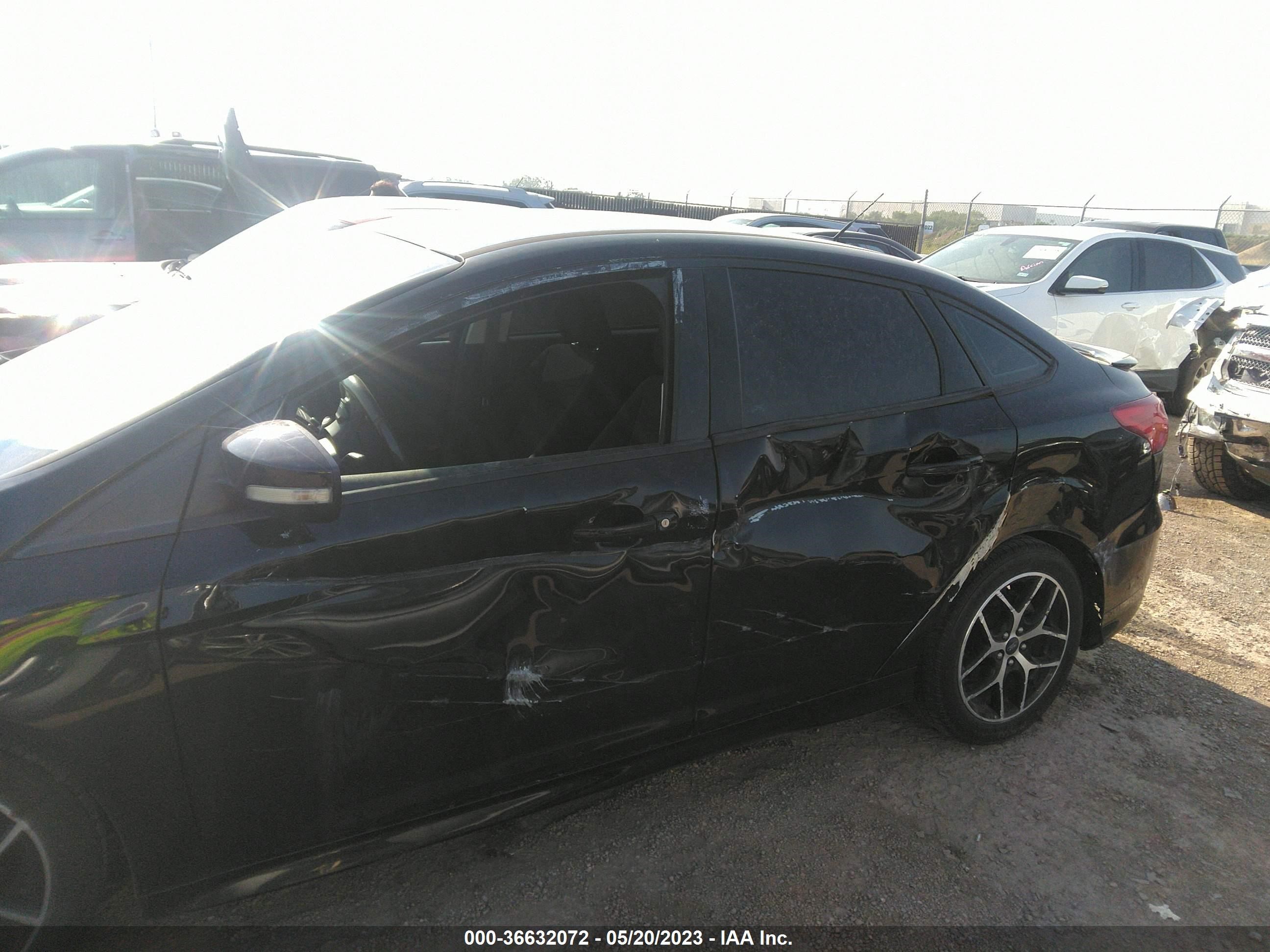 Photo 5 VIN: 1FADP3F28GL404475 - FORD FOCUS 