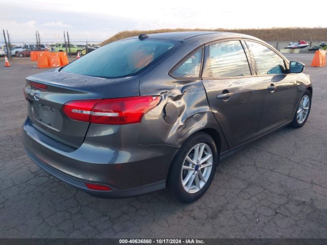 Photo 3 VIN: 1FADP3F28GL406887 - FORD FOCUS 