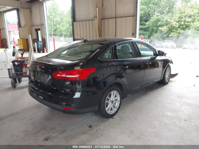 Photo 3 VIN: 1FADP3F28HL231235 - FORD FOCUS 