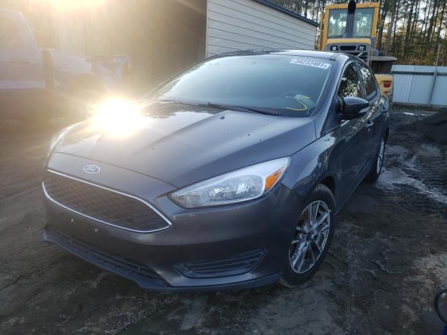 Photo 1 VIN: 1FADP3F28HL265451 - FORD FOCUS SE 