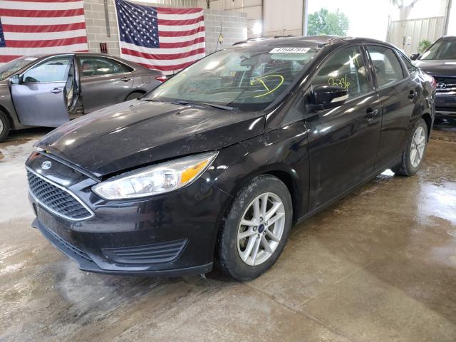 Photo 1 VIN: 1FADP3F28HL287045 - FORD FOCUS SE 