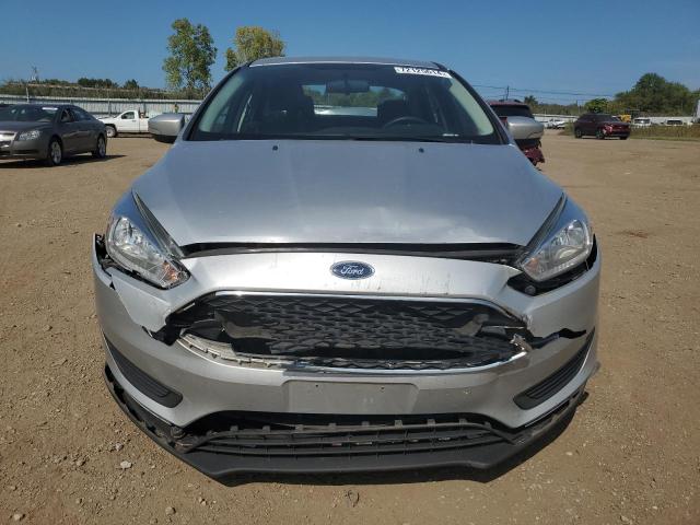 Photo 4 VIN: 1FADP3F28HL302689 - FORD FOCUS SE 