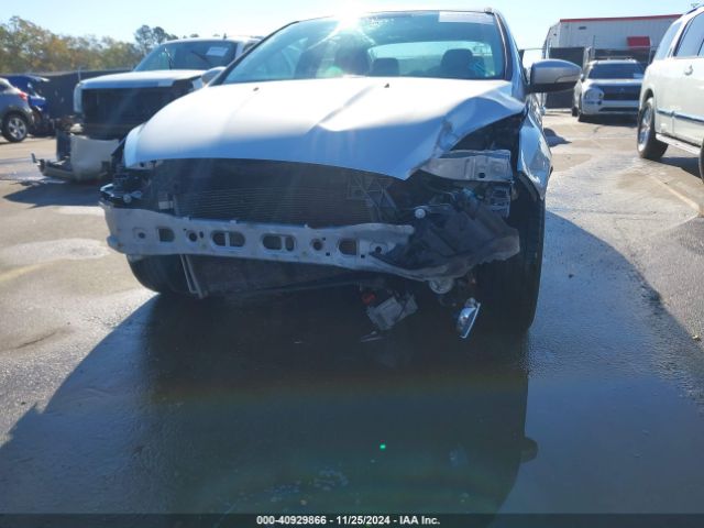 Photo 5 VIN: 1FADP3F28HL345669 - FORD FOCUS 