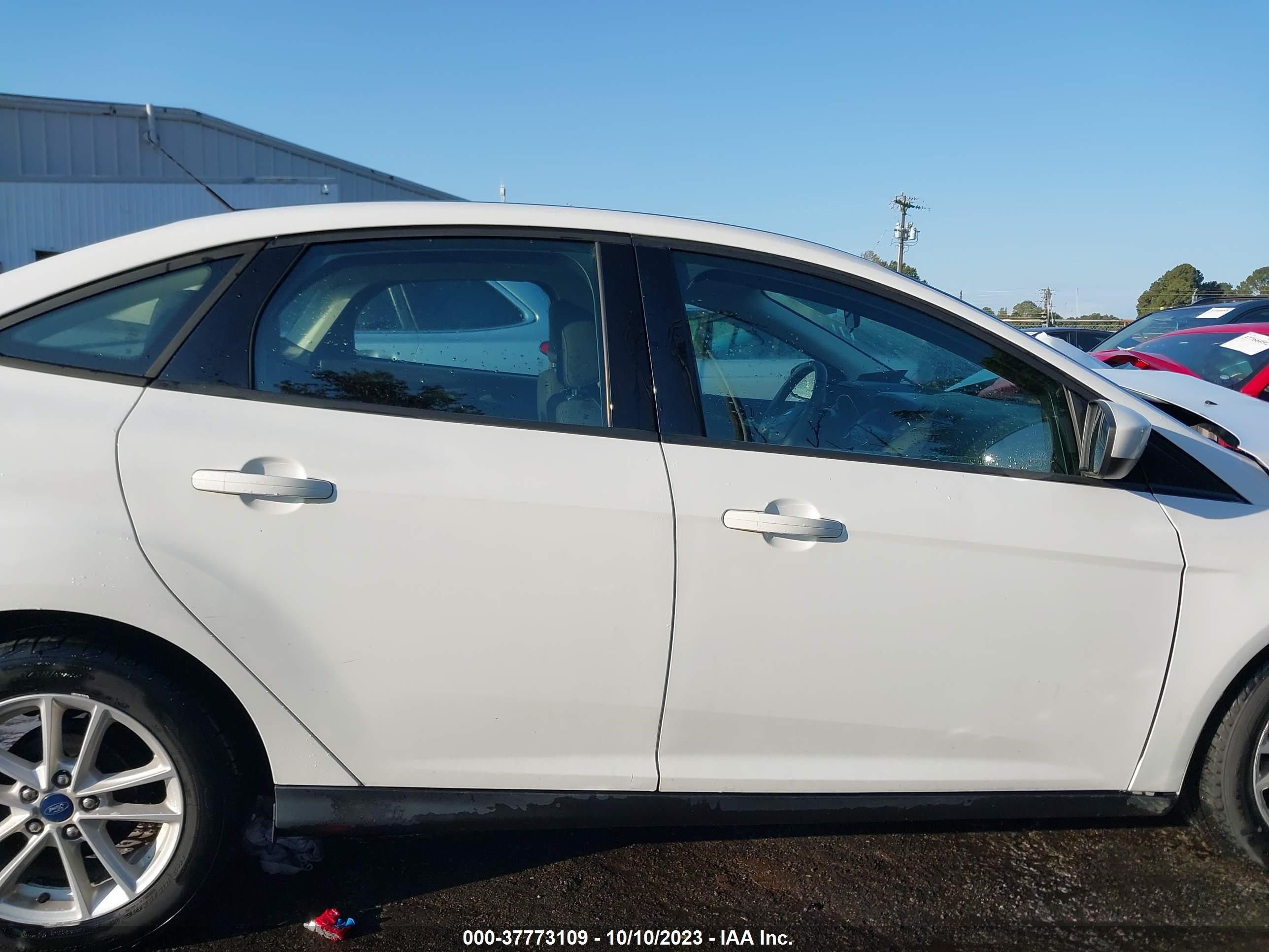 Photo 12 VIN: 1FADP3F28JL200847 - FORD FOCUS 