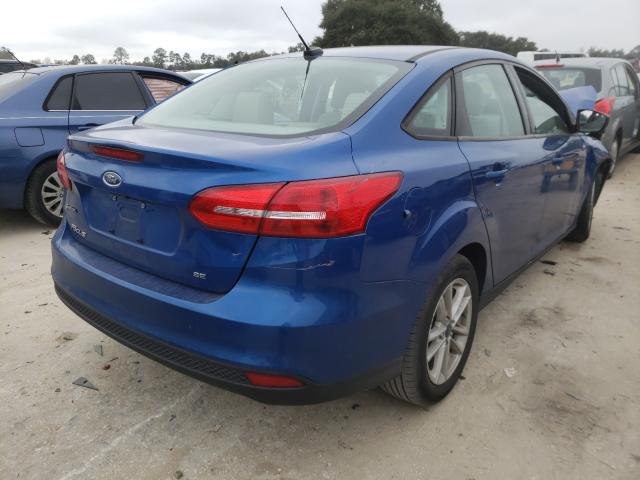 Photo 3 VIN: 1FADP3F28JL201674 - FORD FOCUS 