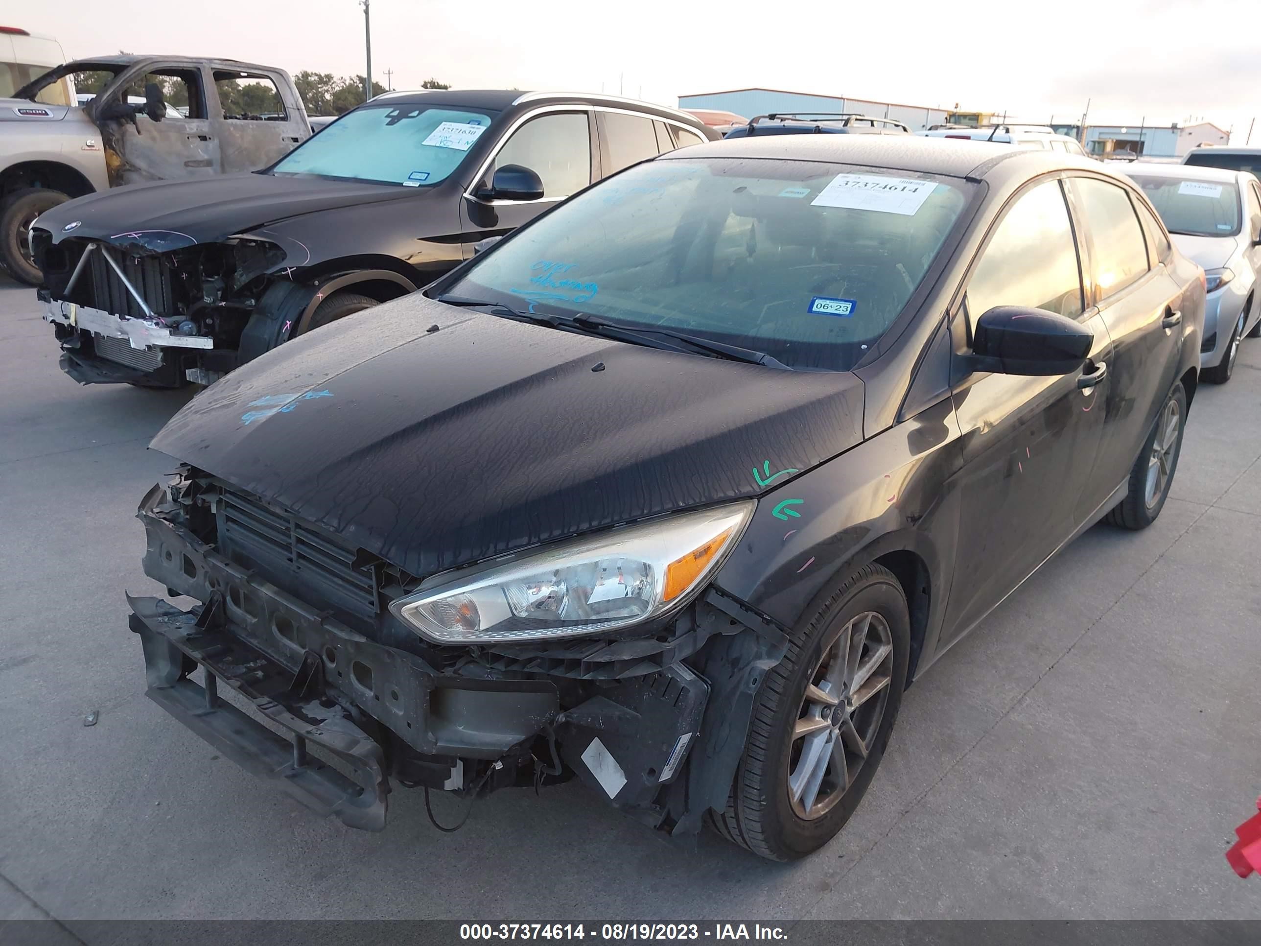 Photo 1 VIN: 1FADP3F28JL206549 - FORD FOCUS 