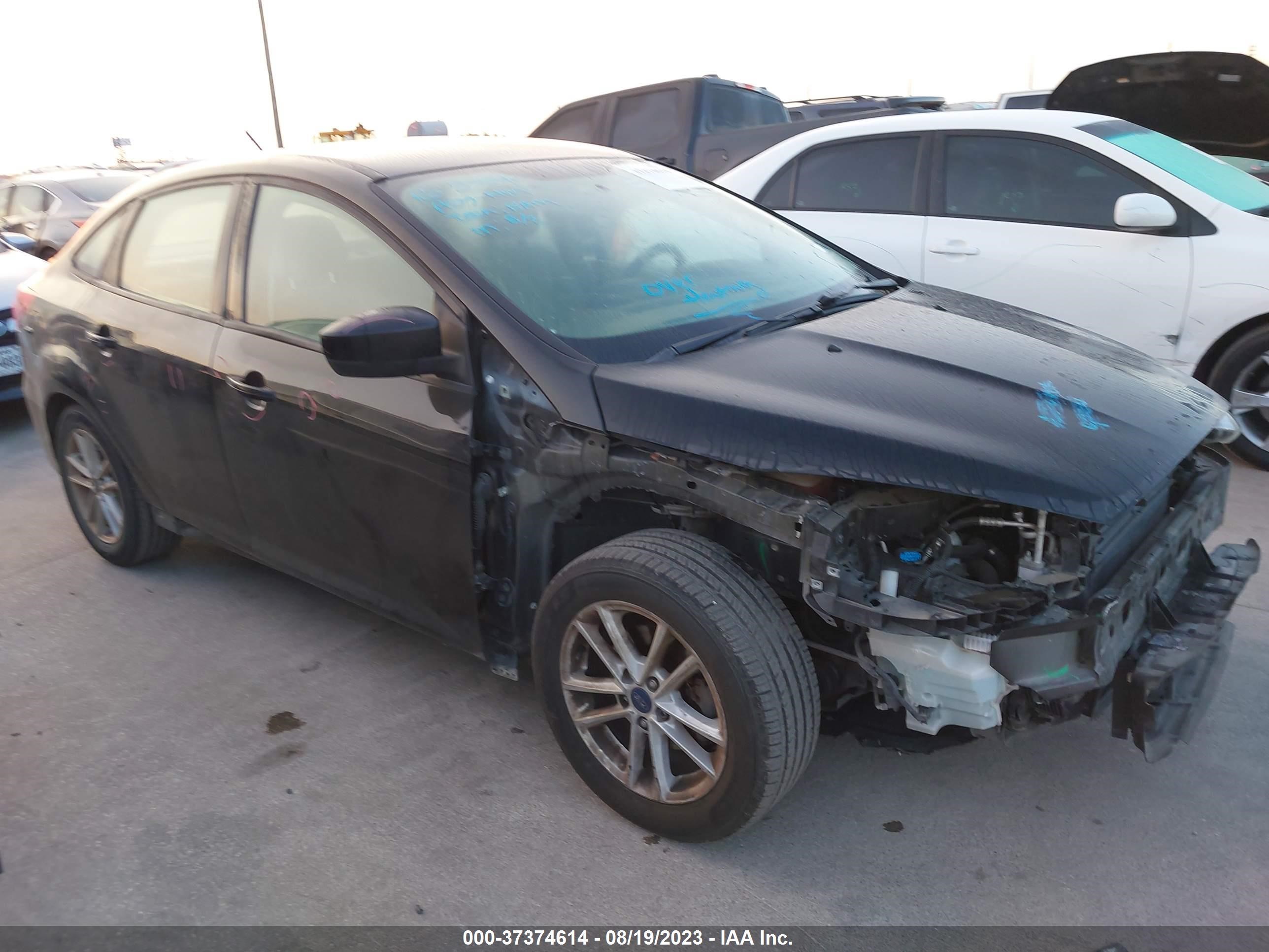 Photo 12 VIN: 1FADP3F28JL206549 - FORD FOCUS 