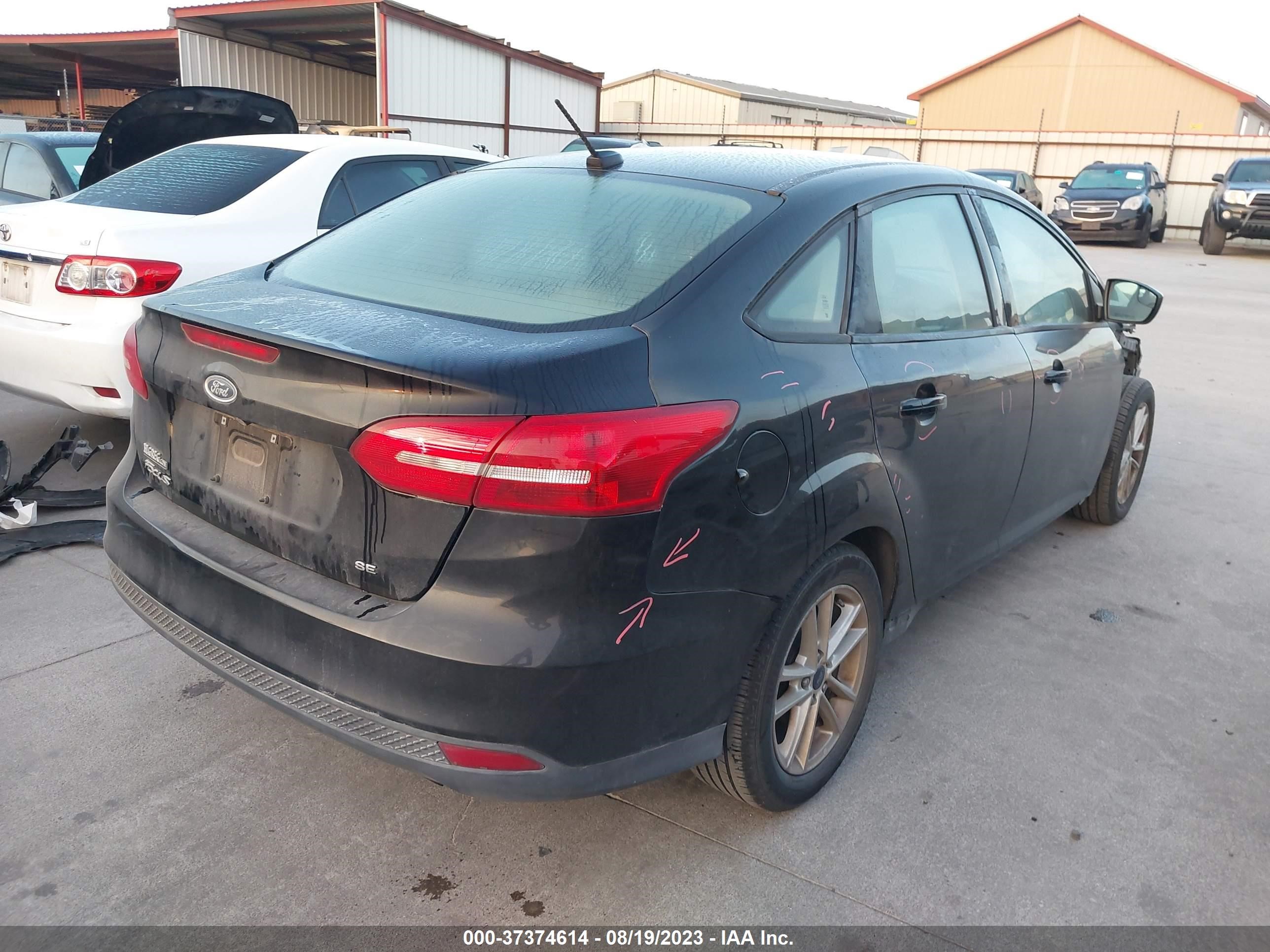 Photo 3 VIN: 1FADP3F28JL206549 - FORD FOCUS 