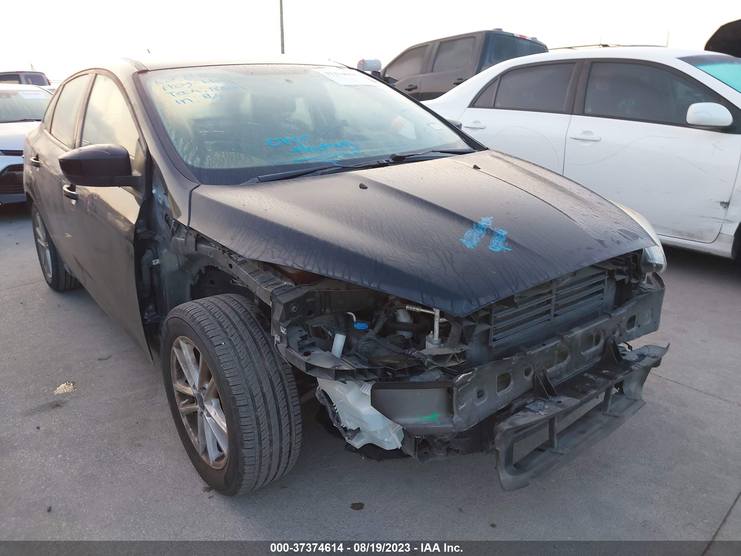 Photo 5 VIN: 1FADP3F28JL206549 - FORD FOCUS 