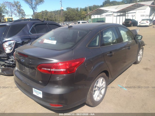 Photo 3 VIN: 1FADP3F28JL206700 - FORD FOCUS 