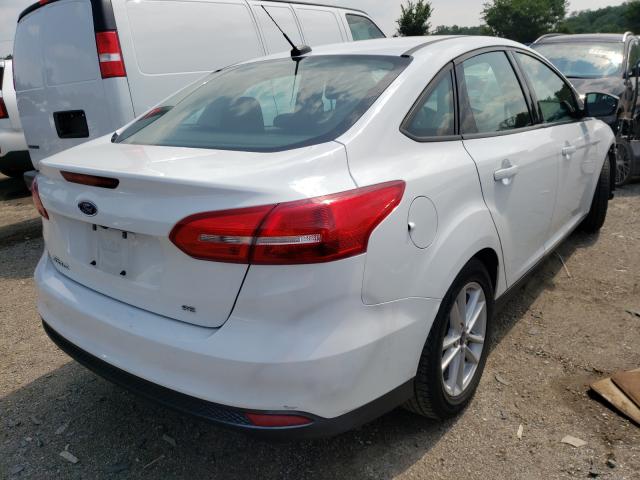 Photo 3 VIN: 1FADP3F28JL207023 - FORD FOCUS SE 