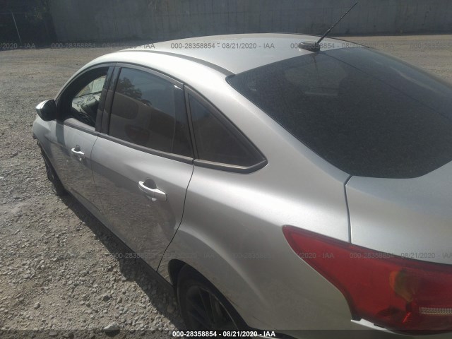 Photo 2 VIN: 1FADP3F28JL228728 - FORD FOCUS 