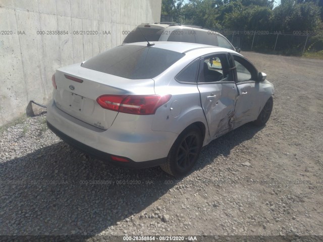 Photo 3 VIN: 1FADP3F28JL228728 - FORD FOCUS 