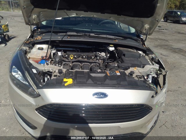 Photo 9 VIN: 1FADP3F28JL248882 - FORD FOCUS 