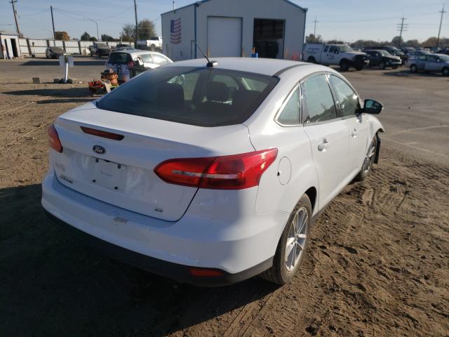 Photo 3 VIN: 1FADP3F28JL260255 - FORD FOCUS SE 