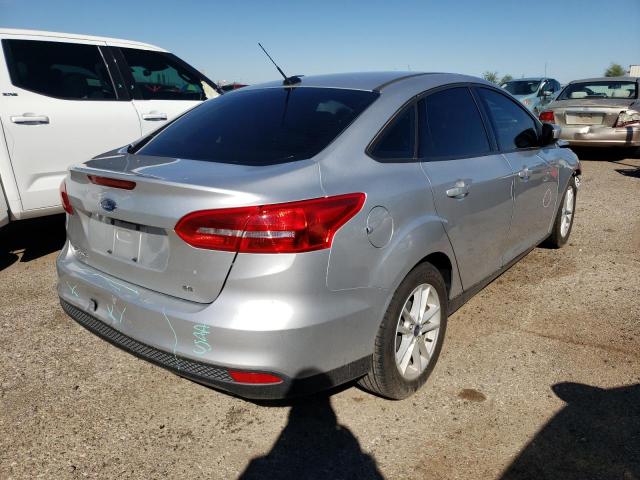 Photo 3 VIN: 1FADP3F28JL270879 - FORD FOCUS SE 