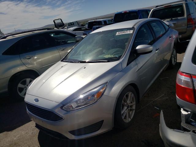 Photo 1 VIN: 1FADP3F28JL288699 - FORD FOCUS SE 