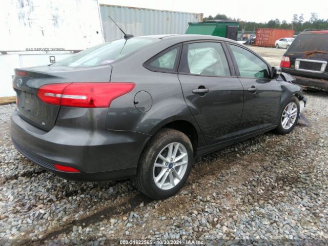 Photo 3 VIN: 1FADP3F28JL291361 - FORD FOCUS 