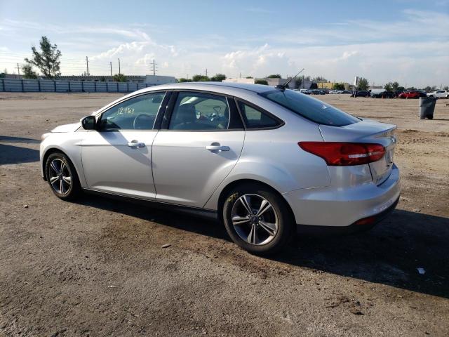 Photo 1 VIN: 1FADP3F28JL299587 - FORD FOCUS SE 