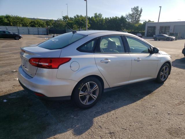 Photo 2 VIN: 1FADP3F28JL299587 - FORD FOCUS SE 