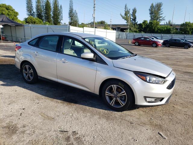 Photo 3 VIN: 1FADP3F28JL299587 - FORD FOCUS SE 