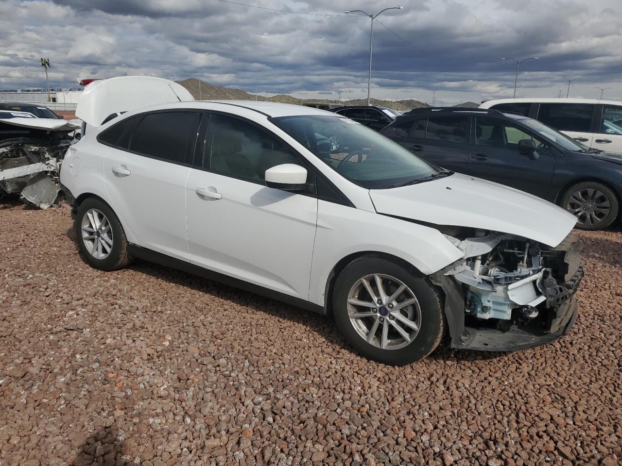 Photo 3 VIN: 1FADP3F28JL303542 - FORD FOCUS 