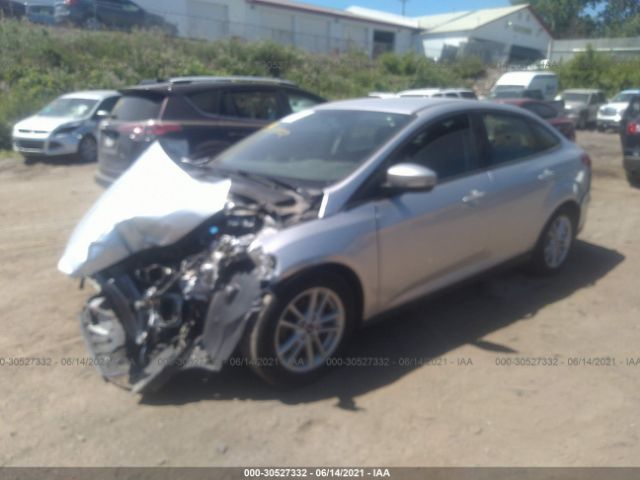 Photo 1 VIN: 1FADP3F28JL322432 - FORD FOCUS 