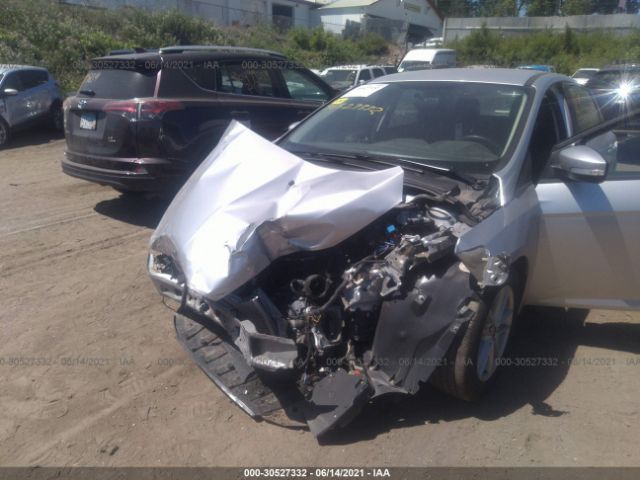 Photo 5 VIN: 1FADP3F28JL322432 - FORD FOCUS 