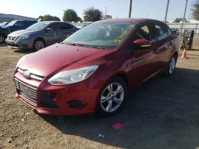 Photo 1 VIN: 1FADP3F29DL108148 - FORD FOCUS SE 