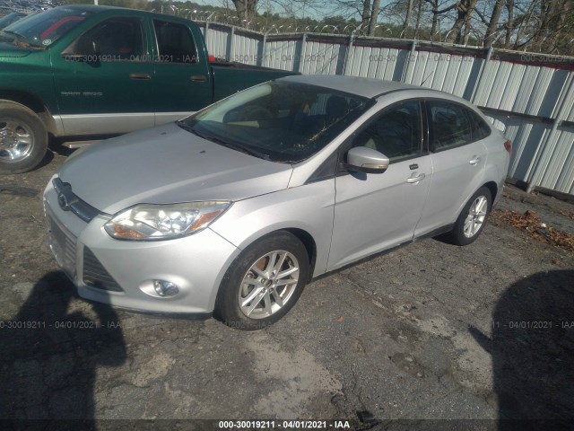 Photo 1 VIN: 1FADP3F29DL259409 - FORD FOCUS 