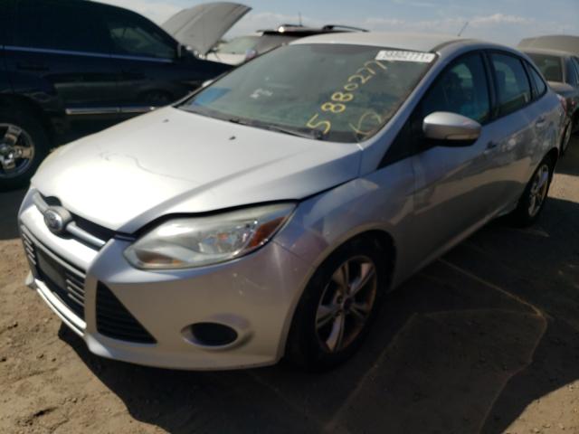 Photo 1 VIN: 1FADP3F29DL337980 - FORD FOCUS SE 