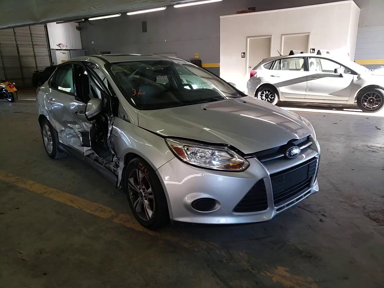 Photo 10 VIN: 1FADP3F29DL343178 - FORD FOCUS 