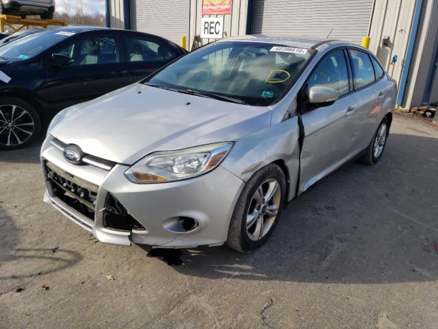 Photo 1 VIN: 1FADP3F29DL348669 - FORD FOCUS SE 