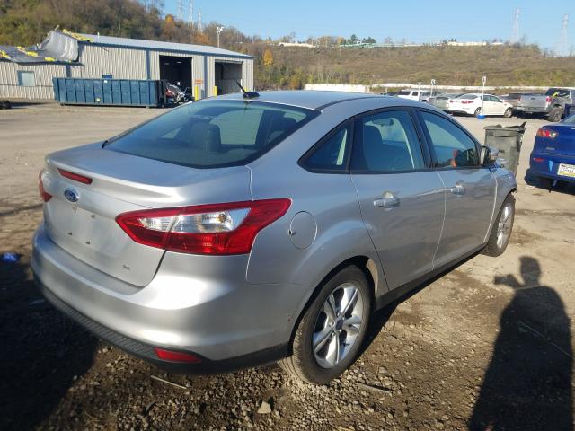 Photo 3 VIN: 1FADP3F29DL369893 - FORD FOCUS SE 