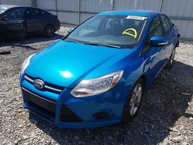 Photo 1 VIN: 1FADP3F29DL371112 - FORD FOCUS SE 