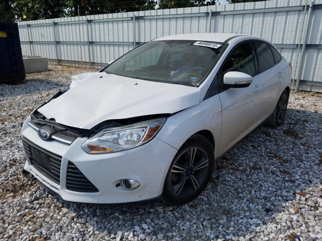 Photo 1 VIN: 1FADP3F29EL112136 - FORD FOCUS 