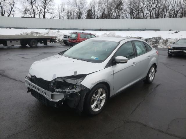 Photo 1 VIN: 1FADP3F29EL125811 - FORD FOCUS SE 