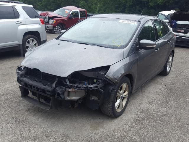 Photo 1 VIN: 1FADP3F29EL128627 - FORD FOCUS SE 