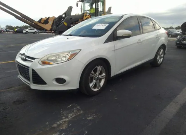 Photo 1 VIN: 1FADP3F29EL142754 - FORD FOCUS 